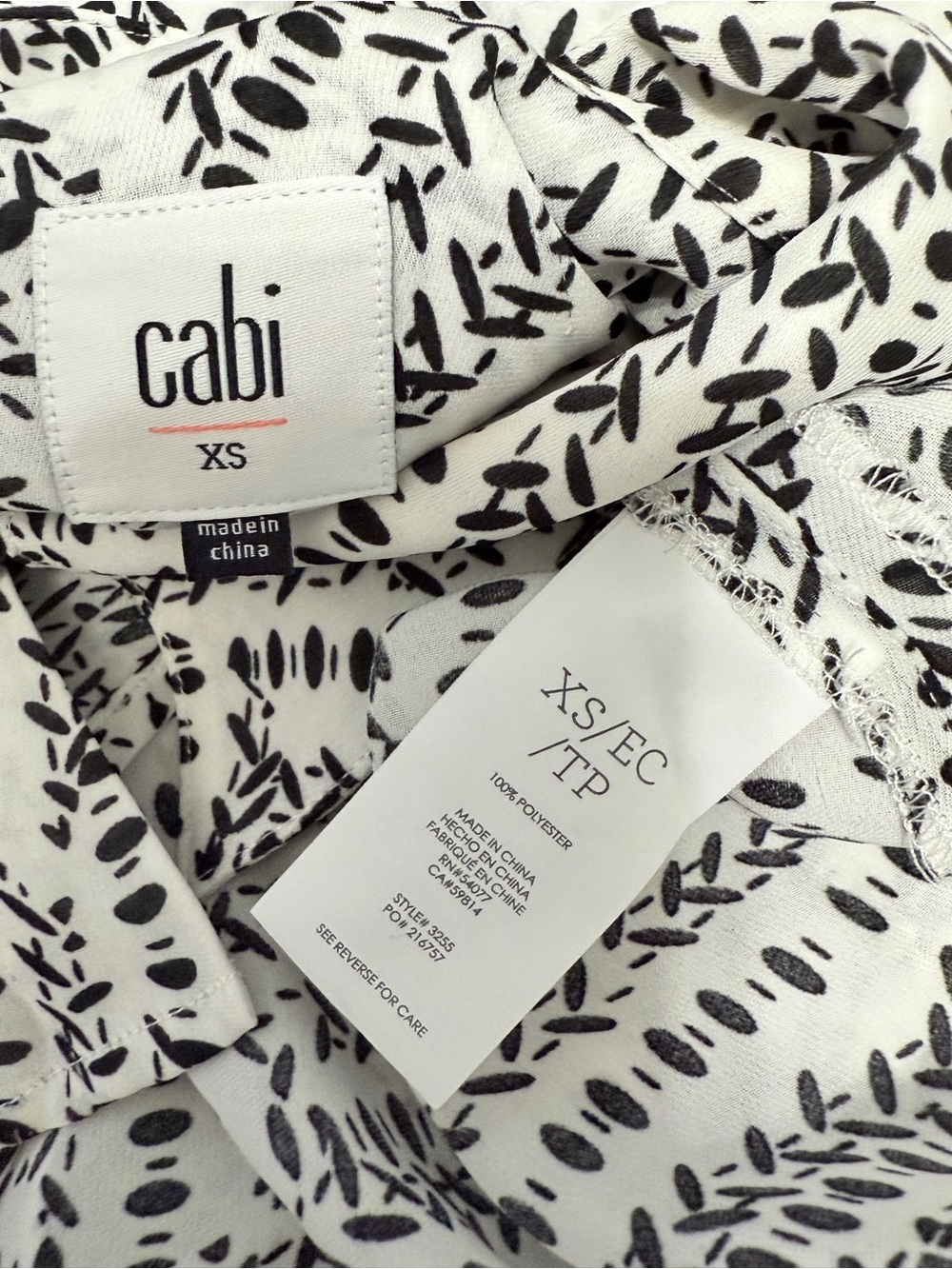 #1)  CAbi Black & White Patterned Button-Down Blouse With Wrap Style Back - Picture 6 of 6
